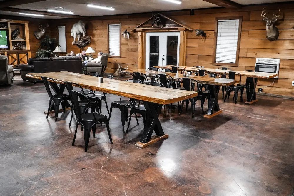 Delta Outdoors Co. lodge dining tables arranged for group meals after Arkansas waterfowl hunts.